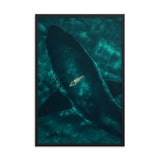 Beneath the Surface – Woman on a Surfboard Above a Massive Shark Framed Poster